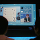 Spectators watch as Go player Ke Jie plays a match against Google’s artificial intelligence program, AlphaGo, during the Future of Go Summit in China on May 23, 2017. (Image: AP)